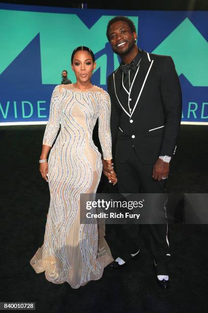 Keyshia Ka'Oir and Gucci Mane attend the 2017 MTV Video Music Awards at The Forum on August 27, 2017 in Inglewood, California.