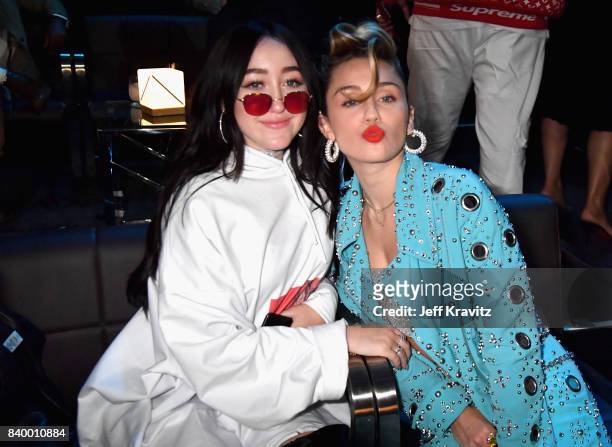 Noah Cyrus and Miley Cyrus attend the 2017 MTV Video Music Awards at The Forum on August 27, 2017 in Inglewood, California.