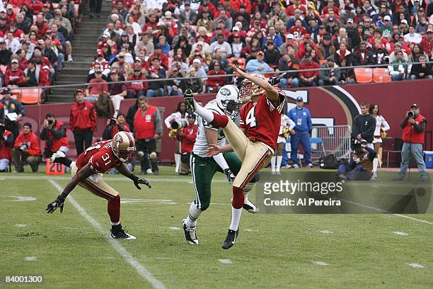 Punter Andy Lee of the San Francisco 49ers hits a long one against the New York Jets on December 7, 2008 at Candlestick Park, San Francisco,...