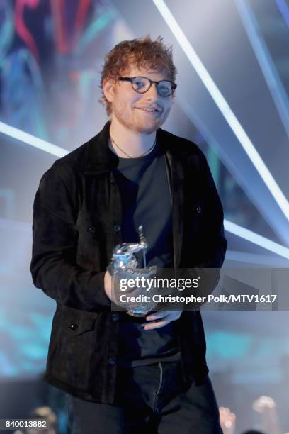 Ed Sheeran accepts the Artist of the Year award onstage during the 2017 MTV Video Music Awards at The Forum on August 27, 2017 in Inglewood,...