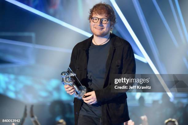 Ed Sheeran accepts the Artist of the Year award onstage during the 2017 MTV Video Music Awards at The Forum on August 27, 2017 in Inglewood,...