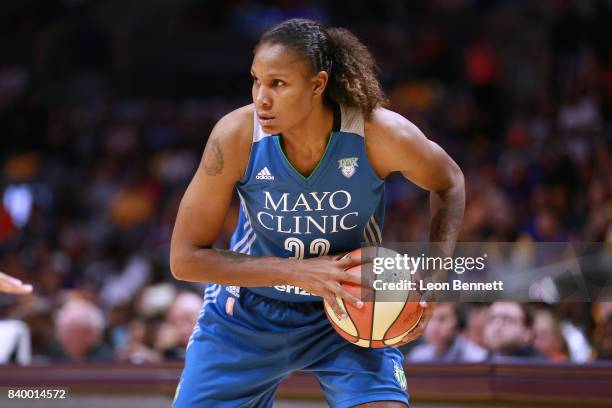 Rebekkah Brunson of the Minnesota Lynx handles the ball against the Los Angeles Sparks during a WNBA basketball game at Staples Center on August 27,...