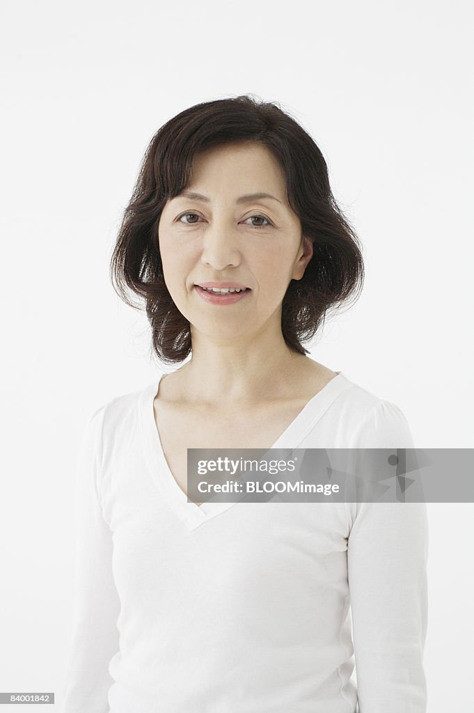 Portrait of senior woman, studio shot