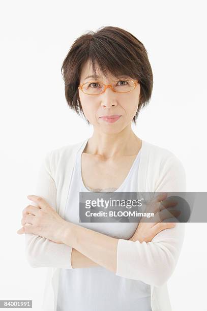portrait of woman wearing glasses, close-up, studio shot - portrait close up loosely stock pictures, royalty-free photos & images