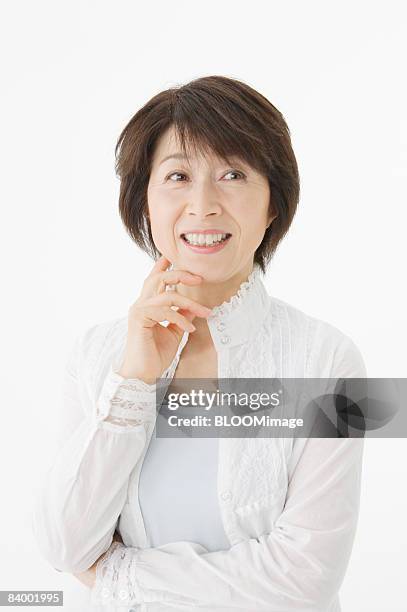 portrait of woman, close-up, studio shot - portrait close up loosely stock pictures, royalty-free photos & images