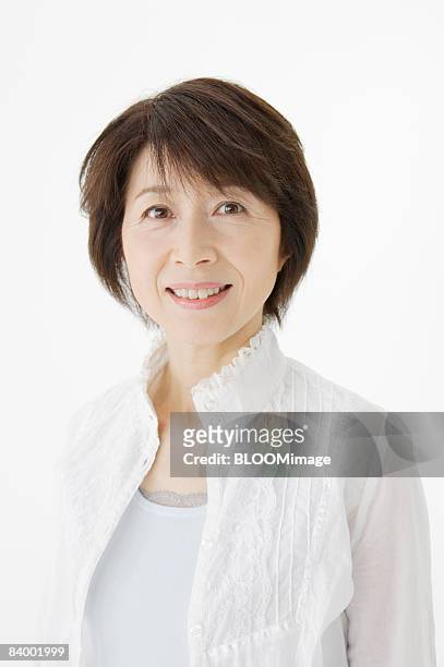 portrait of woman, close-up, studio shot - portrait close up loosely stock pictures, royalty-free photos & images