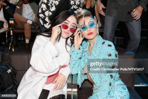 Noah Cyrus and Miley Cyrus attend the 2017 MTV Video Music Awards at The Forum on August 27, 2017 in Inglewood, California.