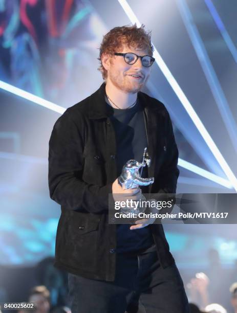 Ed Sheeran accepts the Artist of the Year award onstage during the 2017 MTV Video Music Awards at The Forum on August 27, 2017 in Inglewood,...