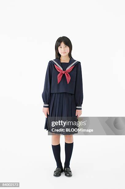 portrait of female student, studio shot - japanese school uniform stock pictures, royalty-free photos & images