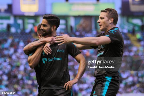 Diego de Buen and Julio Lurch of Santos celebrates their team's second goal during the seventh round match between Leon and Santos Laguna as part of...