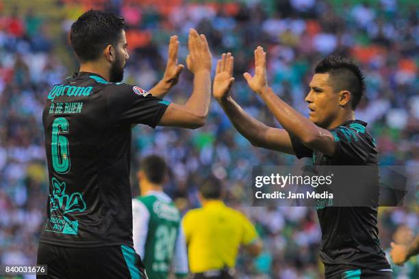 Diego de Buen and Julio Lurch of Santos celebrates their team's second goal during the seventh round match between Leon and Santos Laguna as part of...