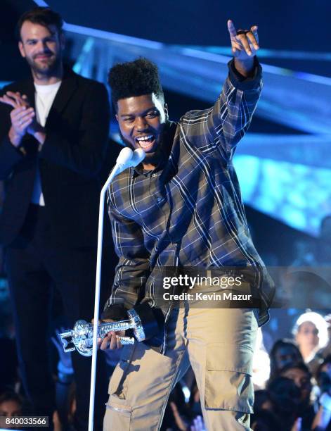 Singer/songwriter Khalid accepts award onsstage during the 2017 MTV Video Music Awards at The Forum on August 27, 2017 in Inglewood, California.