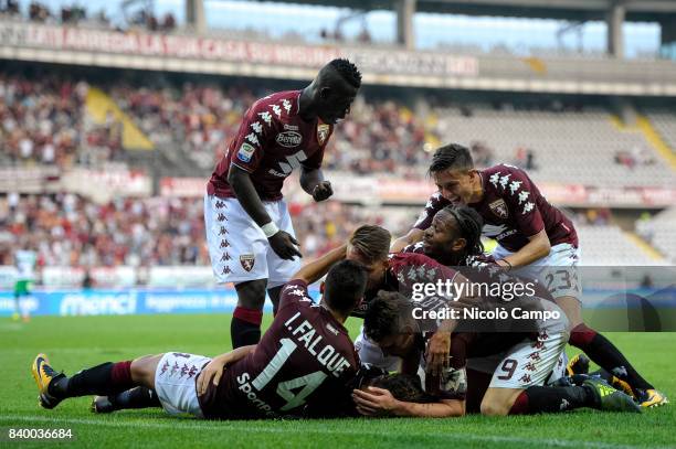 Adem Ljajic of Torino FC celebrates with his team mates after scoring a goal during the Serie A football match between Torino FC and US Sassuolo....