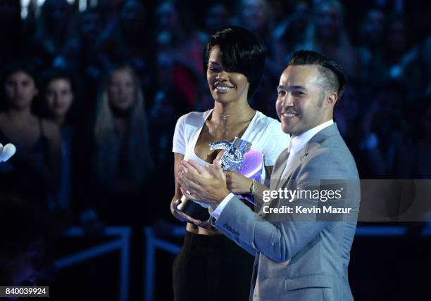 Teyana Taylor and Pete Wentz speak onstage during the 2017 MTV Video Music Awards at The Forum on August 27, 2017 in Inglewood, California.