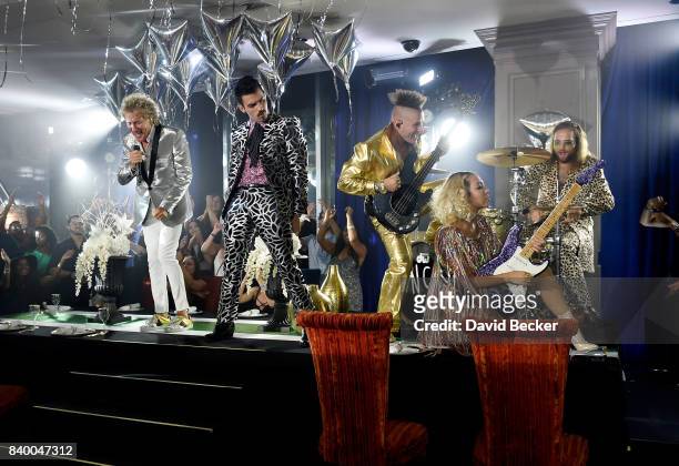 Sir Rod Stewart and Joe Jonas, Cole Whittle, JinJoo Lee and Jack Lawless of DNCE perform during a pre-taping for the 2017 MTV Video Music Awards at...