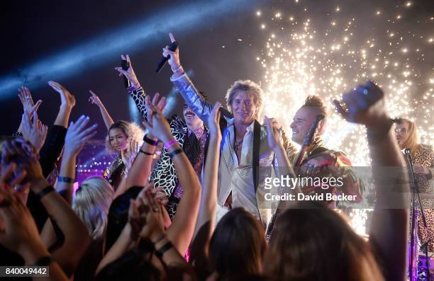 Singer Sir Rod Stewart and DNCE perform during a pre-taping for the 2017 MTV Video Music Awards at the Palms Casino Resort on August 24, 2017 in Las...