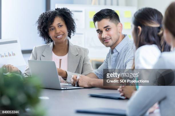 attentive diverse businesspeople participate in meeting - vicepresident stock pictures, royalty-free photos & images