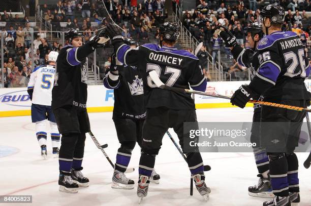 The Los Angeles Kings celebrate a first-period goal by teammate Alexander Frolov during the game against the St. Louis Blues on December 11, 2008 at...