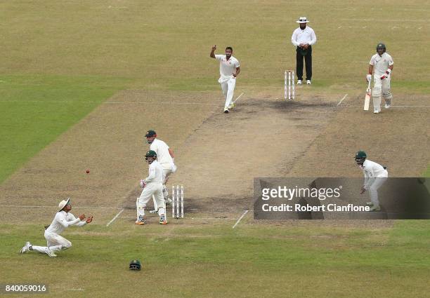 Matthew Renshaw of Australia is caught at slip by Soumya Sarkar of Bangladesh off the bowling of Shakib Al Hasan during day two of the First Test...