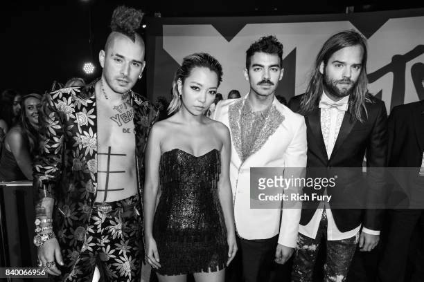 Cole Whittle, JinJoo Lee, Joe Jonas, and Jack Lawless of music group DNCE attend the 2017 MTV Video Music Awards at The Forum on August 27, 2017 in...