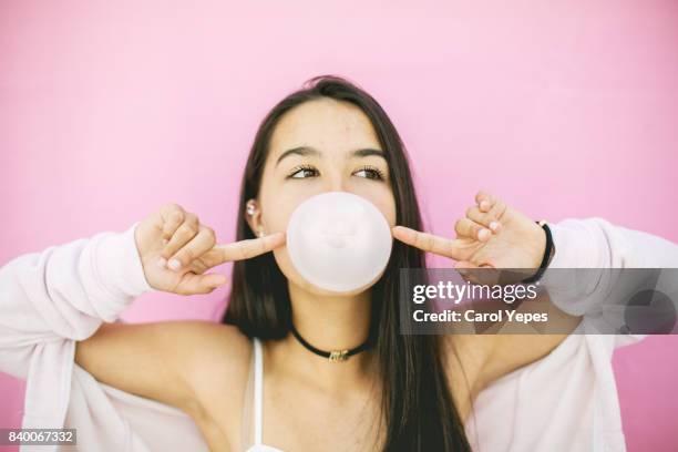 pink bubble gum girl - chewing gum stock pictures, royalty-free photos & images