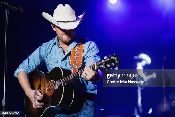 Country music singer Justin Moore performs on stage during the Hometown Throwdown festival hosted by 100.7 The Wolf at Enumclaw Expo Center on August...