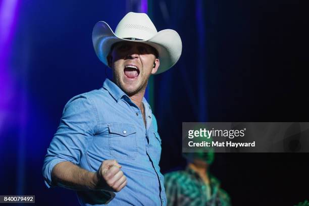 Country music singer Justin Moore performs on stage during the Hometown Throwdown festival hosted by 100.7 The Wolf at Enumclaw Expo Center on August...