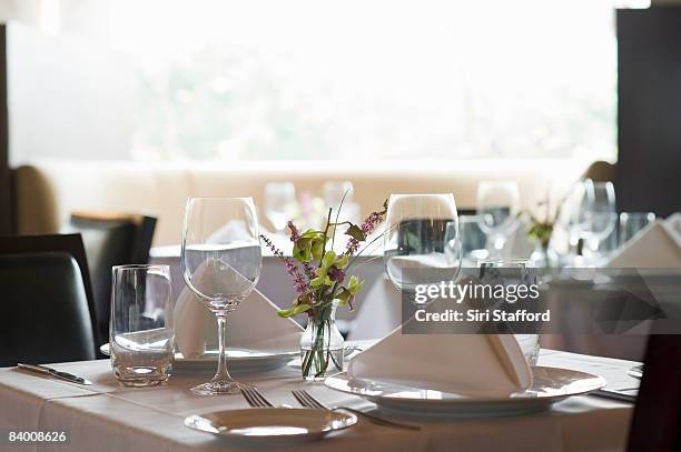 unoccupied table in restaurant. - place setting stock pictures, royalty-free photos & images