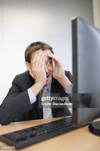 Embarrasing Computer Desktop Photo 215 Embarrassed Man Computer Stock Photos, High-Res Pictures, and ...