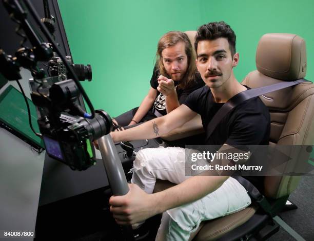 Jack Lawless and Joe Jonas of DNCE attend the VMA after party hosted by Republic Records and Cadillac at TAO restaurant at the Dream Hotel on August...