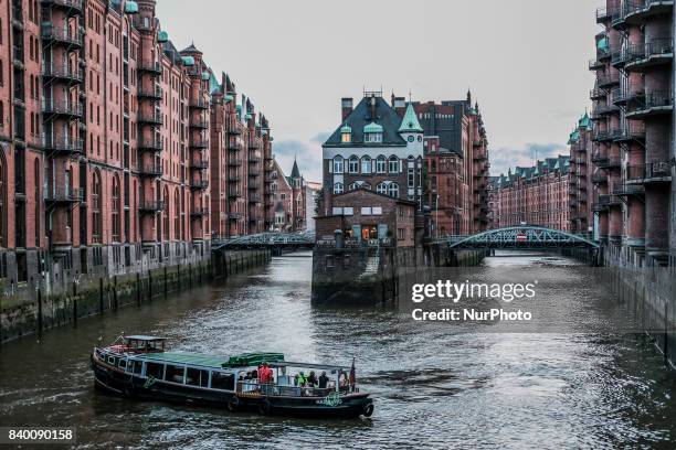 View of Wandrahmsfleet in Speicherstadt, located in Hamburg, Germany, on 27 August 2017. It is the largest wood-piled warehouse district in the...