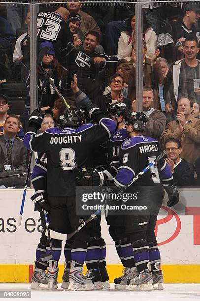 The Los Angeles Kings celebrate a goal in the second period by teammate Anze Kopitar during the game against the St. Louis Blues on December 11, 2008...