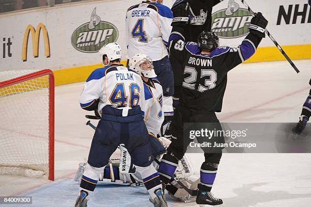 Dustin Brown of the Los Angeles Kings celebrates in the third period his first career hat trick against the St. Louis Blues during the game on...