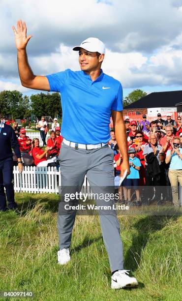 Julian Suri of the USA acknowledges the crowd on the 18th green during the final round of the Made in Denmark at Himmerland Golf & Spa Resort on...