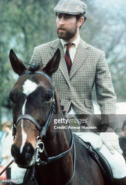 Prince Charles, Prince of Wales, dressed in traditional tweeds and sporting a smart naval beard, rides the acres of Badminton on May 3, 1976 in...