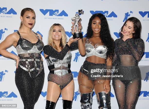 Dinah Jane, Ally Brooke, Normani Kordei and Lauren Jauregui of Fifth Harmony, winners of Best Pop for 'Down', pose in the press room at the 2017 MTV...