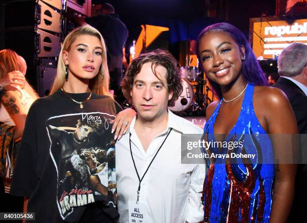 Hailey Baldwin, Republic Records President Charlie Walk and Justine Skye attend the VMA after party hosted by Republic Records and Cadillac at TAO...