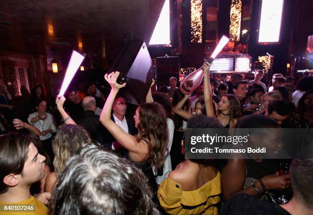 Guests dance at the VMA after party hosted by Republic Records and Cadillac at TAO restaurant at the Dream Hotel on August 27, 2017 in Los Angeles,...