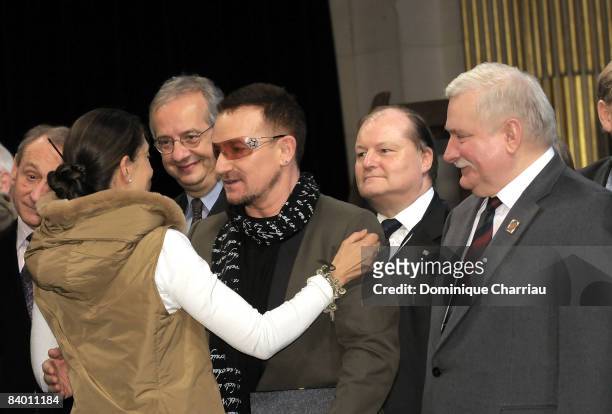 Franco-Colombian politician and former FARC hostage Ingrid Betancourt greets Laureate of the peace summit Award 2008 lead Singer of U2 Bono in the...