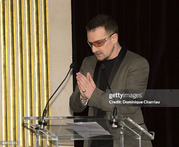 Laureate of the peace summit Award 2008, lead Singer of U2 Bono gives a speech during the 9th Nobel Peace Prize World Summit at the Hotel de Ville on...