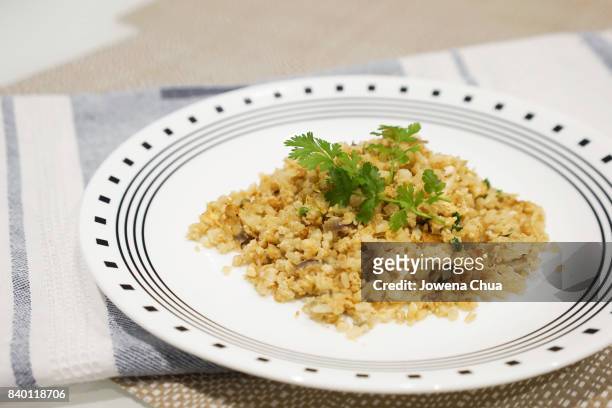 cauliflower rice - cauliflower rice stock pictures, royalty-free photos & images