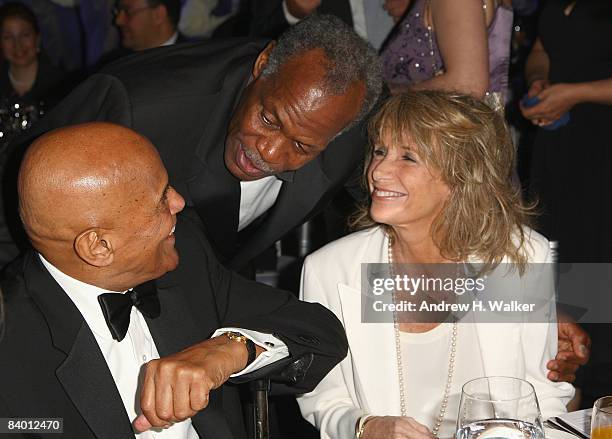 Actor Danny Glover greets Harry Belafonte with his wife Pamela during The 2nd Annual amfAR Cinema Against AIDS Dubai Gala held at the Atlantis, The...