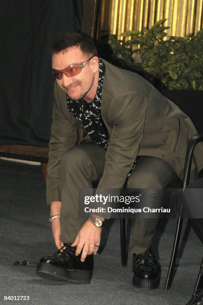 Peace Summit Award Laureate and U2 lead singer Bono attends the 9th Nobel Peace Prize World Summit at Hotel de Ville on December 12, 2008 in Paris,...