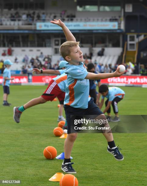 Children participate in ECB All Stars Cricket during the lunch interval during day two of the 2nd Investec Test match between England and West Indies...