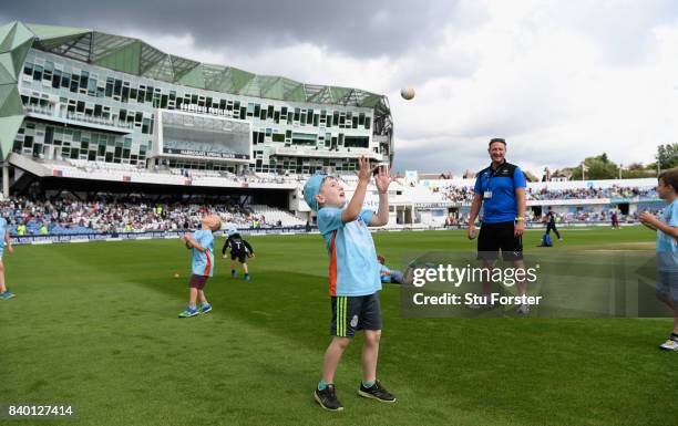 Children participate in ECB All Stars Cricket during the lunch interval during day two of the 2nd Investec Test match between England and West Indies...