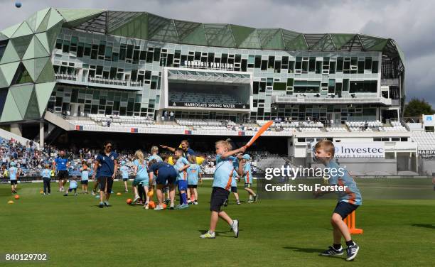 Children participate in ECB All Stars Cricket during the lunch interval during day two of the 2nd Investec Test match between England and West Indies...