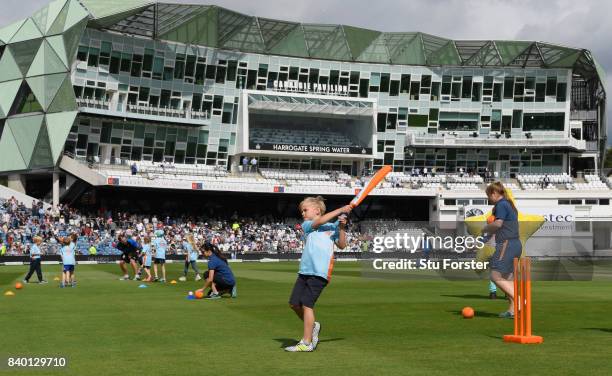 Children participate in ECB All Stars Cricket during the lunch interval during day two of the 2nd Investec Test match between England and West Indies...