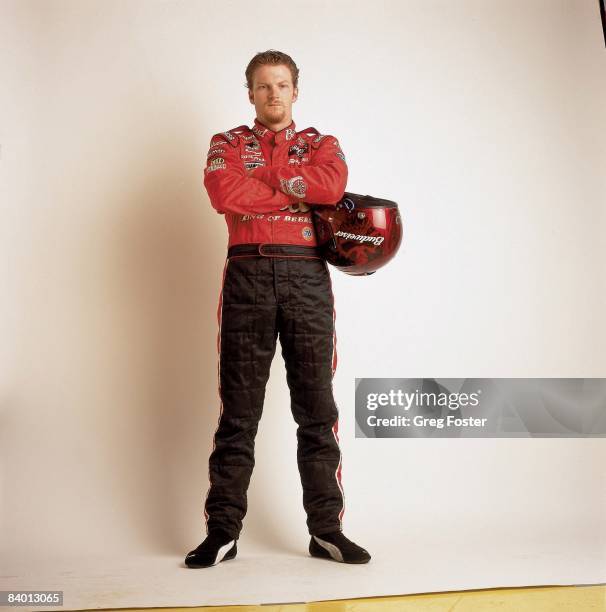 Auto Racing: Portrait of NASCAR driver Dale Earnhardt Jr, with helmet, equipment at Atlanta Motor Speedway, Hampton, GA