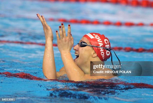 Sanja Jovanovic of Croatia celebrates after winning the women�s 100m backstroke final race during the European Short Course Swimming Championships in...