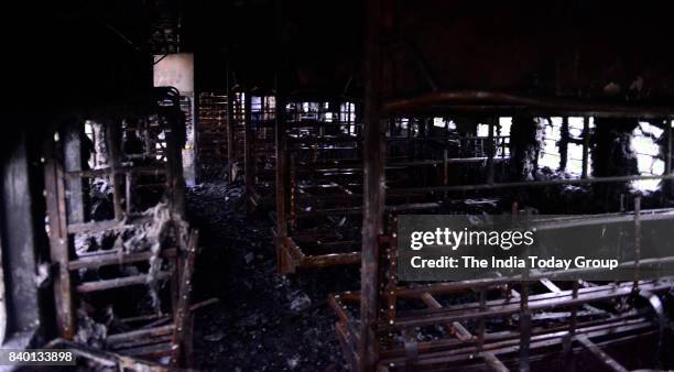 Train set afire at Anand Vihar railway station by Gurmeet Ram Rahims supporters in New Delhi.